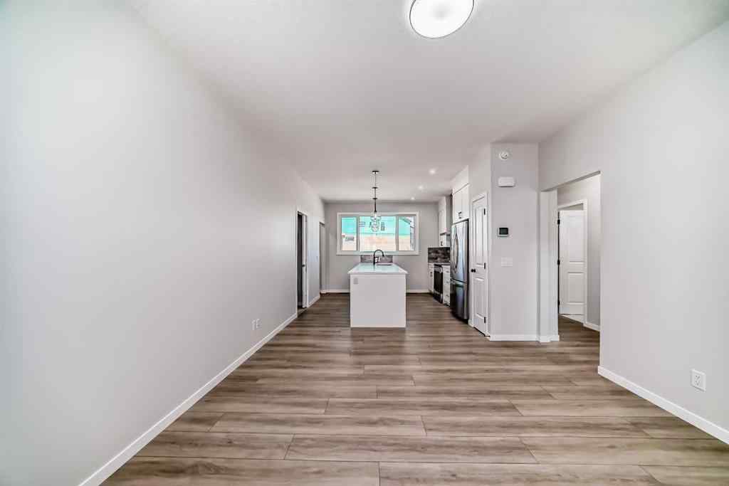 MLS® A2210904 - 208 Lucas Place NW in Livingston Calgary, Residential