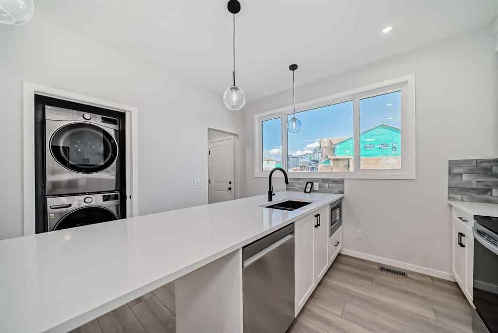 MLS® A2210904 - 208 Lucas Place NW in Livingston Calgary, Residential
