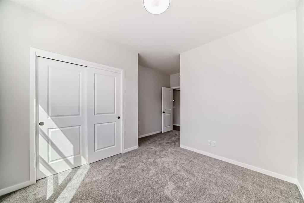 MLS® A2210904 - 208 Lucas Place NW in Livingston Calgary, Residential