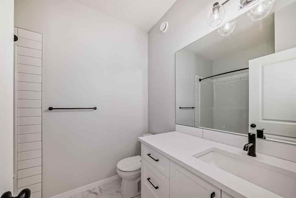 MLS® A2210904 - 208 Lucas Place NW in Livingston Calgary, Residential