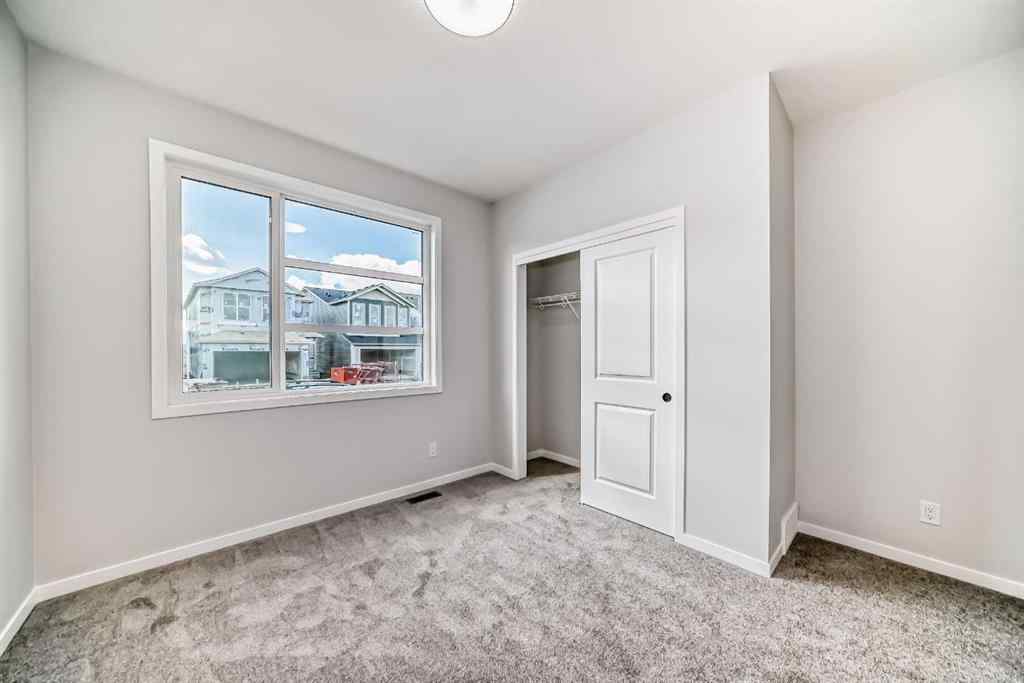 MLS® A2210904 - 208 Lucas Place NW in Livingston Calgary, Residential