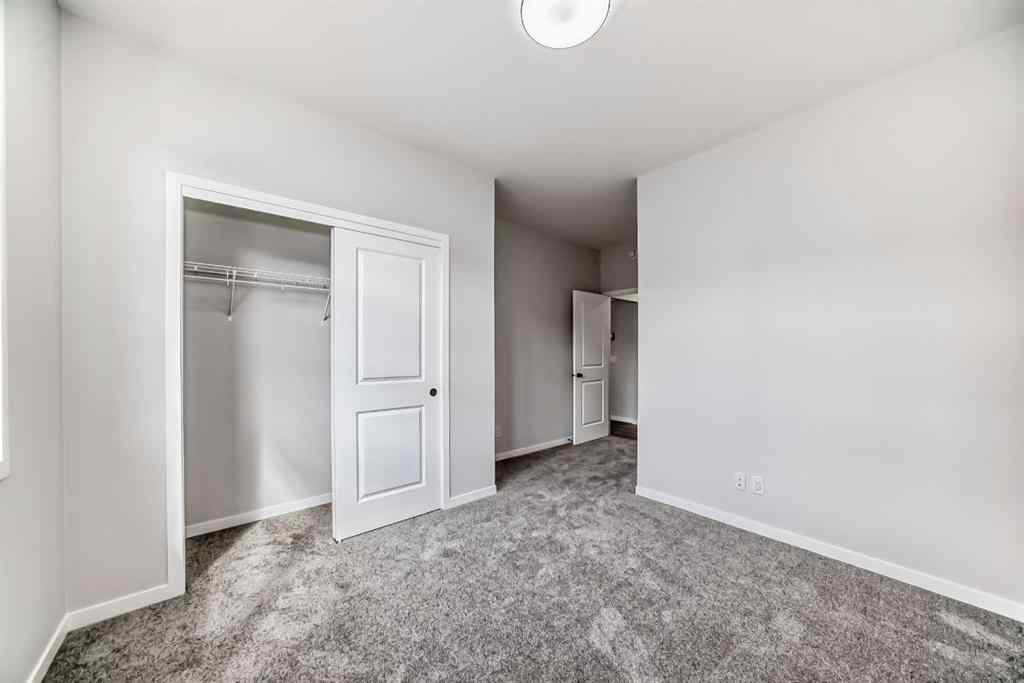 MLS® A2210904 - 208 Lucas Place NW in Livingston Calgary, Residential