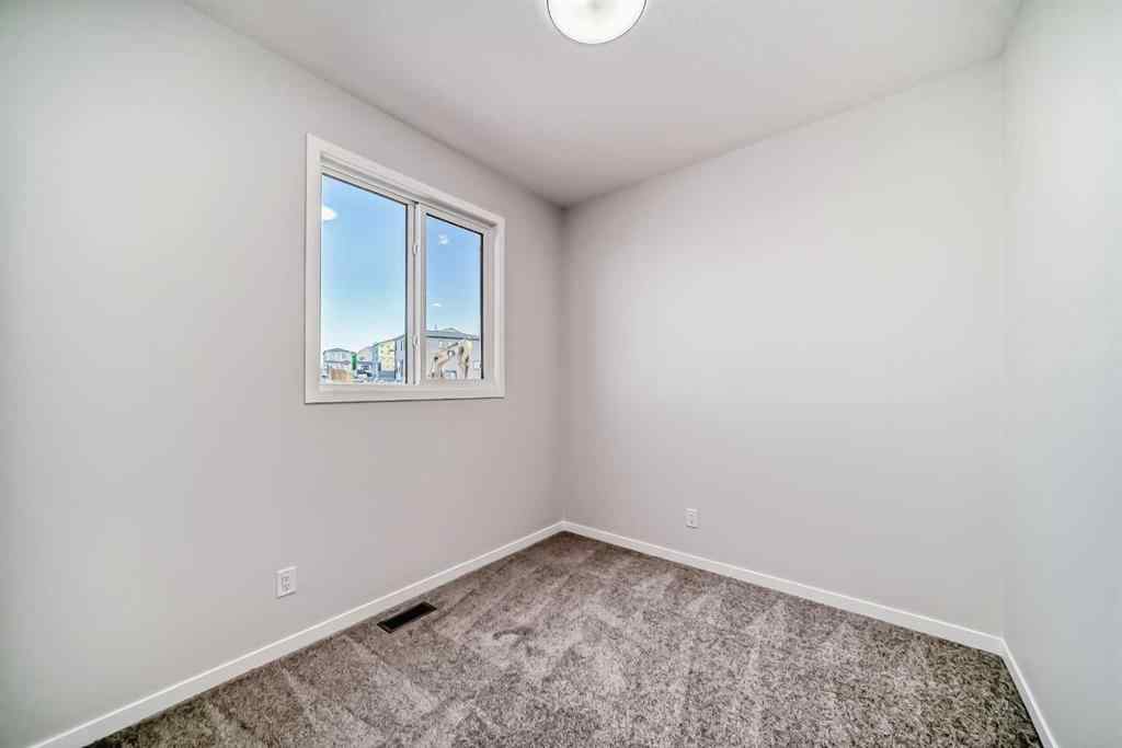 MLS® A2210904 - 208 Lucas Place NW in Livingston Calgary, Residential