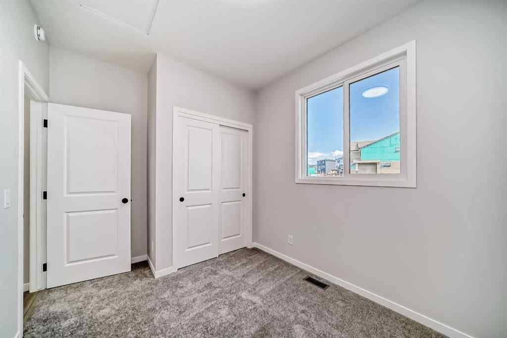 MLS® A2210904 - 208 Lucas Place NW in Livingston Calgary, Residential