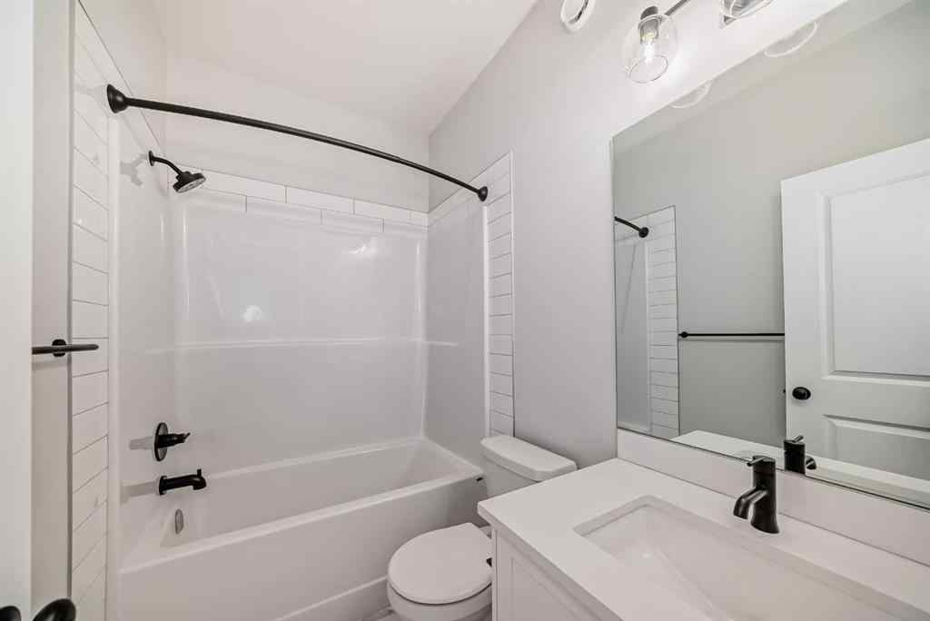 MLS® A2210904 - 208 Lucas Place NW in Livingston Calgary, Residential