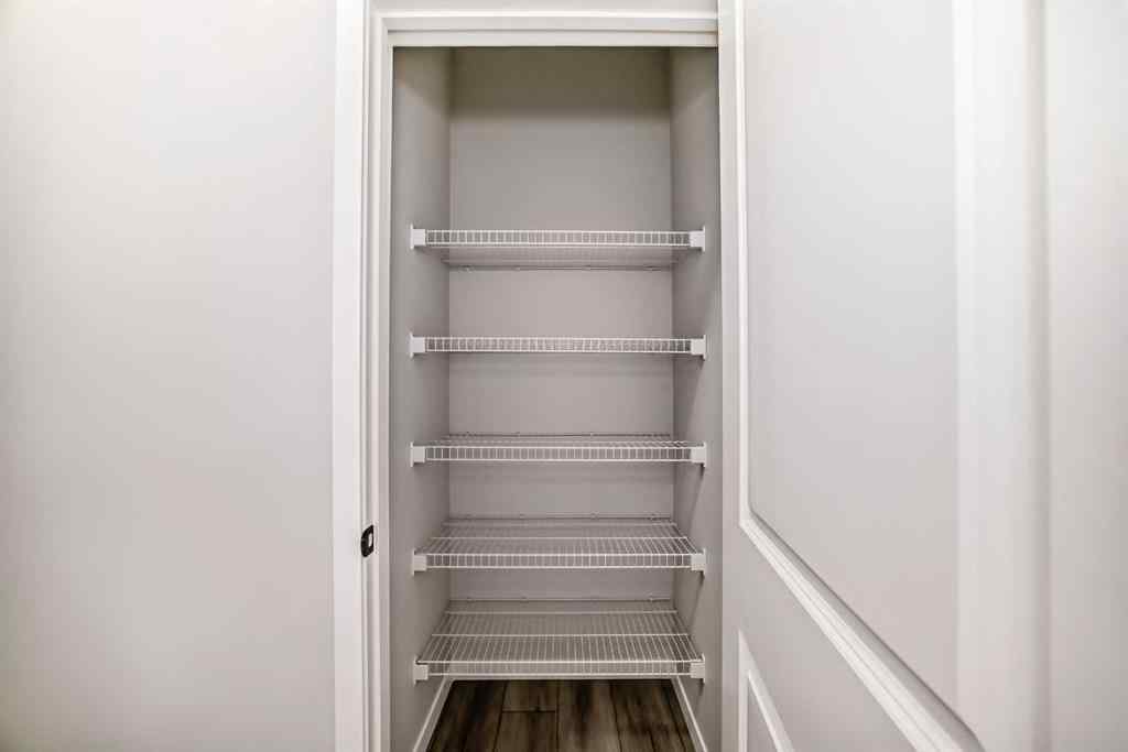 MLS® A2210904 - 208 Lucas Place NW in Livingston Calgary, Residential