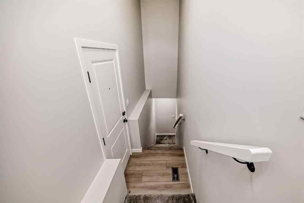 MLS® A2210904 - 208 Lucas Place NW in Livingston Calgary, Residential