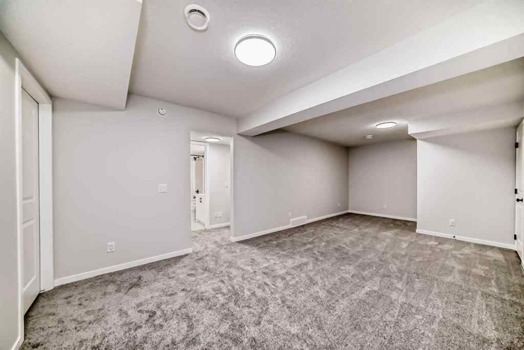 MLS® A2210904 - 208 Lucas Place NW in Livingston Calgary, Residential