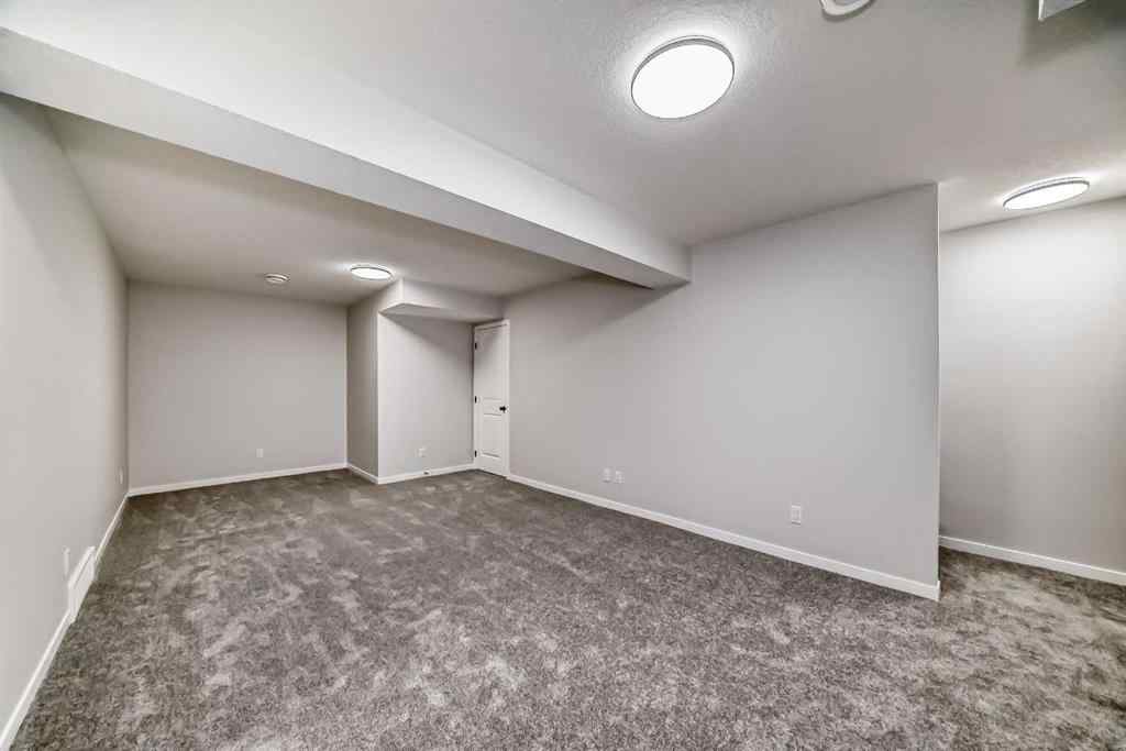 MLS® A2210904 - 208 Lucas Place NW in Livingston Calgary, Residential