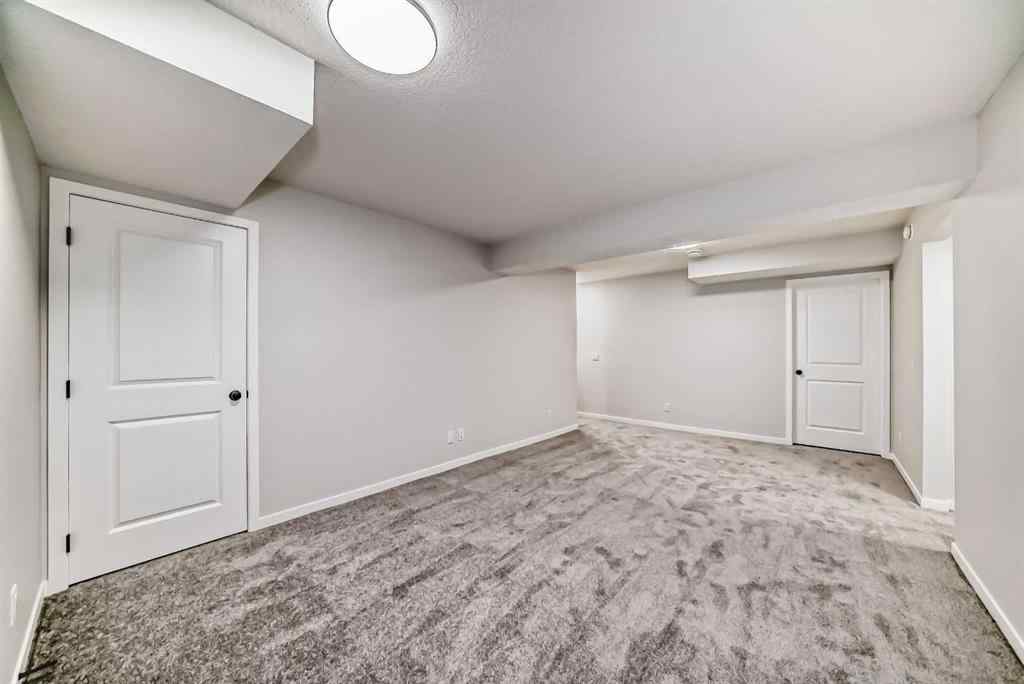 MLS® A2210904 - 208 Lucas Place NW in Livingston Calgary, Residential