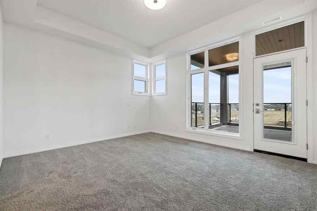 MLS® A2211245 - Unit #301 130 Marina Cove SE in Mahogany Calgary, Residential