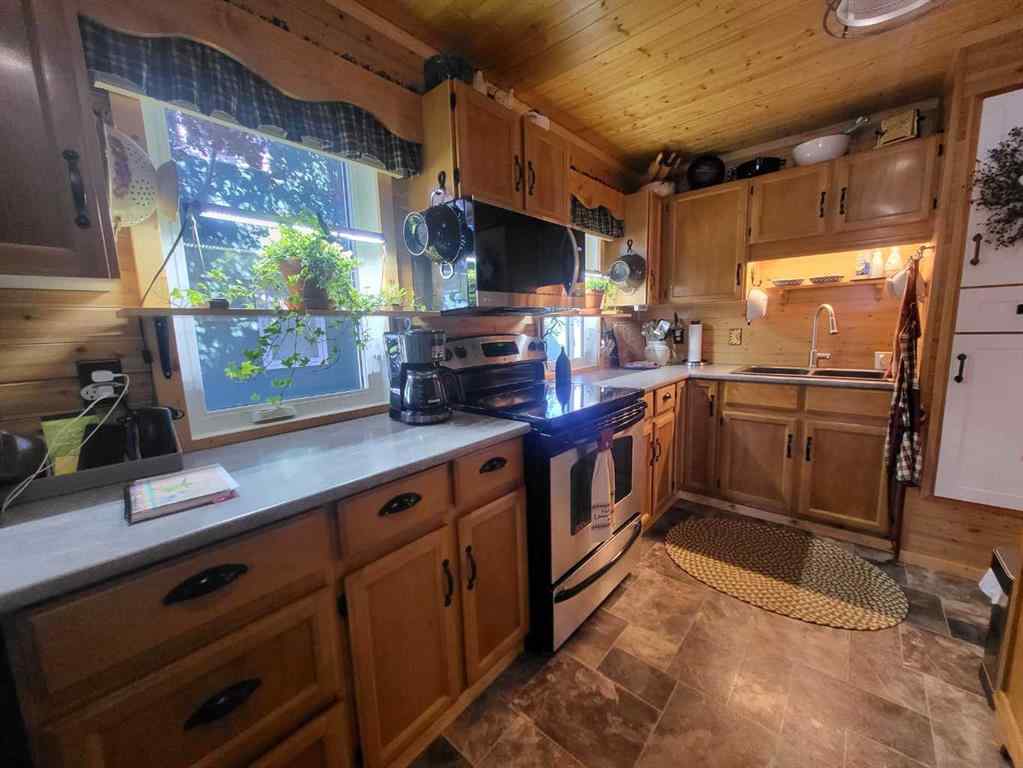 MLS® A2211477 - 9 Mountain Vista Drive  in NONE Hill Spring, Residential
