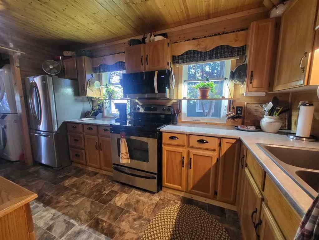 MLS® A2211477 - 9 Mountain Vista Drive  in NONE Hill Spring, Residential
