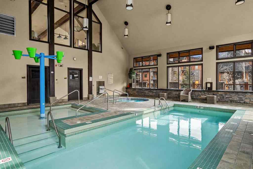 MLS® A2211505 - Unit #1106 101A STEWART CREEK Landing  in Three Sisters Canmore, Residential