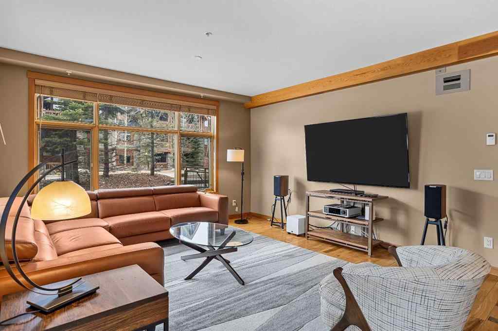 MLS® A2211505 - Unit #1106 101A STEWART CREEK Landing  in Three Sisters Canmore, Residential