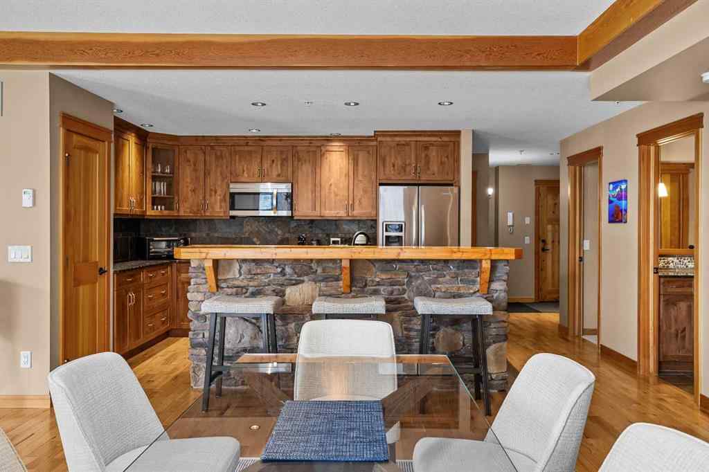 MLS® A2211505 - Unit #1106 101A STEWART CREEK Landing  in Three Sisters Canmore, Residential
