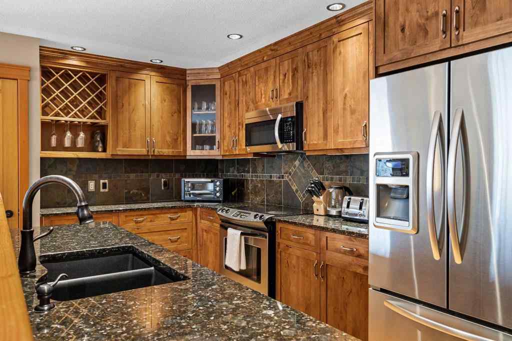 MLS® A2211505 - Unit #1106 101A STEWART CREEK Landing  in Three Sisters Canmore, Residential
