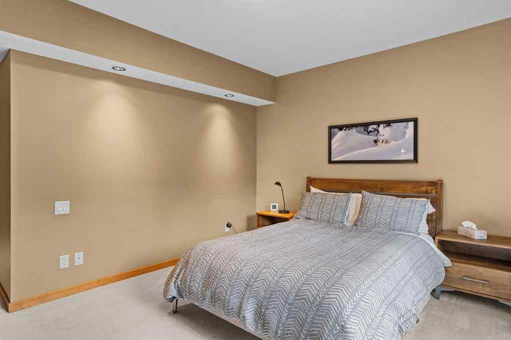 MLS® A2211505 - Unit #1106 101A STEWART CREEK Landing  in Three Sisters Canmore, Residential