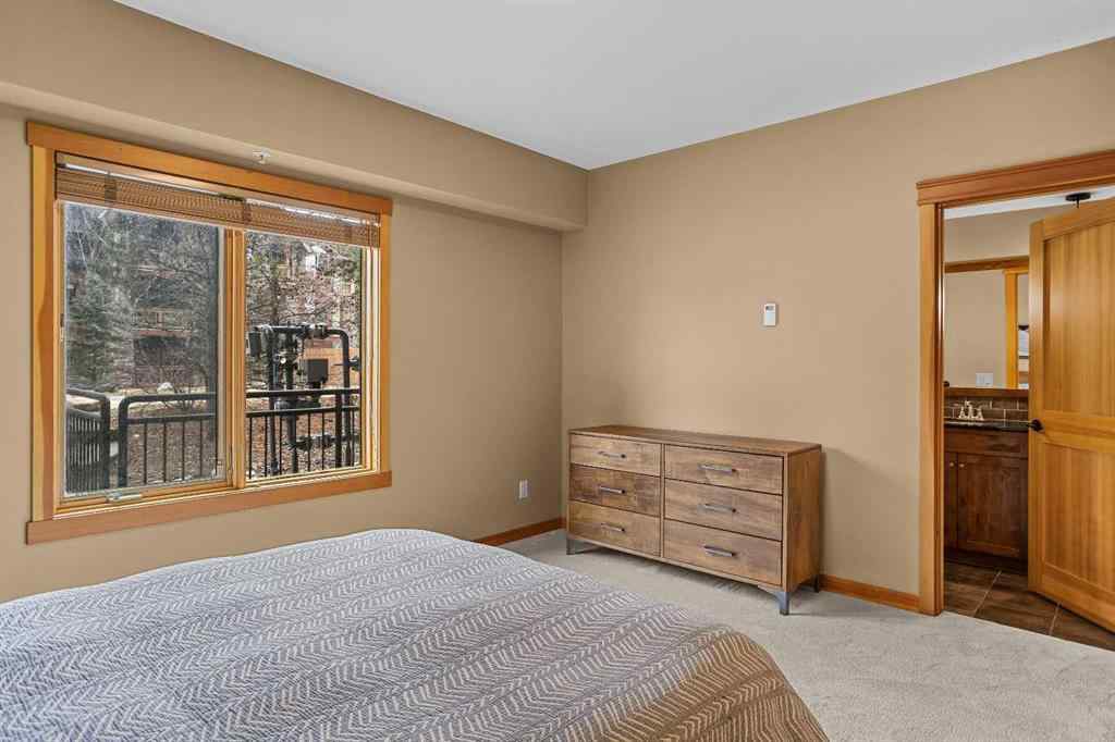 MLS® A2211505 - Unit #1106 101A STEWART CREEK Landing  in Three Sisters Canmore, Residential