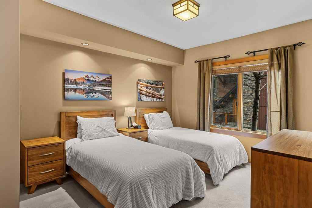 MLS® A2211505 - Unit #1106 101A STEWART CREEK Landing  in Three Sisters Canmore, Residential