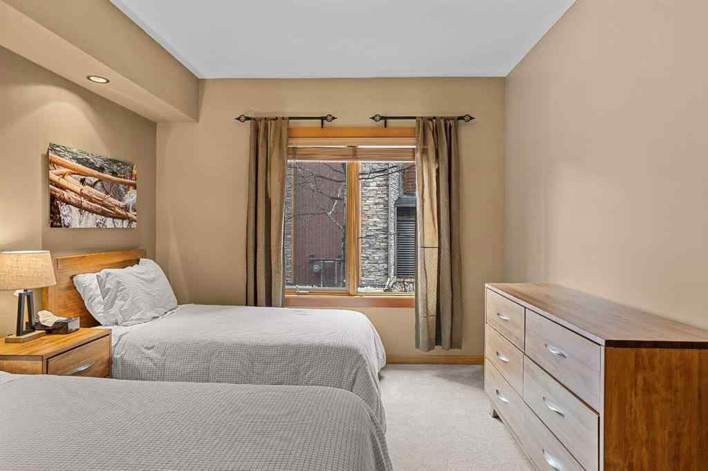 MLS® A2211505 - Unit #1106 101A STEWART CREEK Landing  in Three Sisters Canmore, Residential