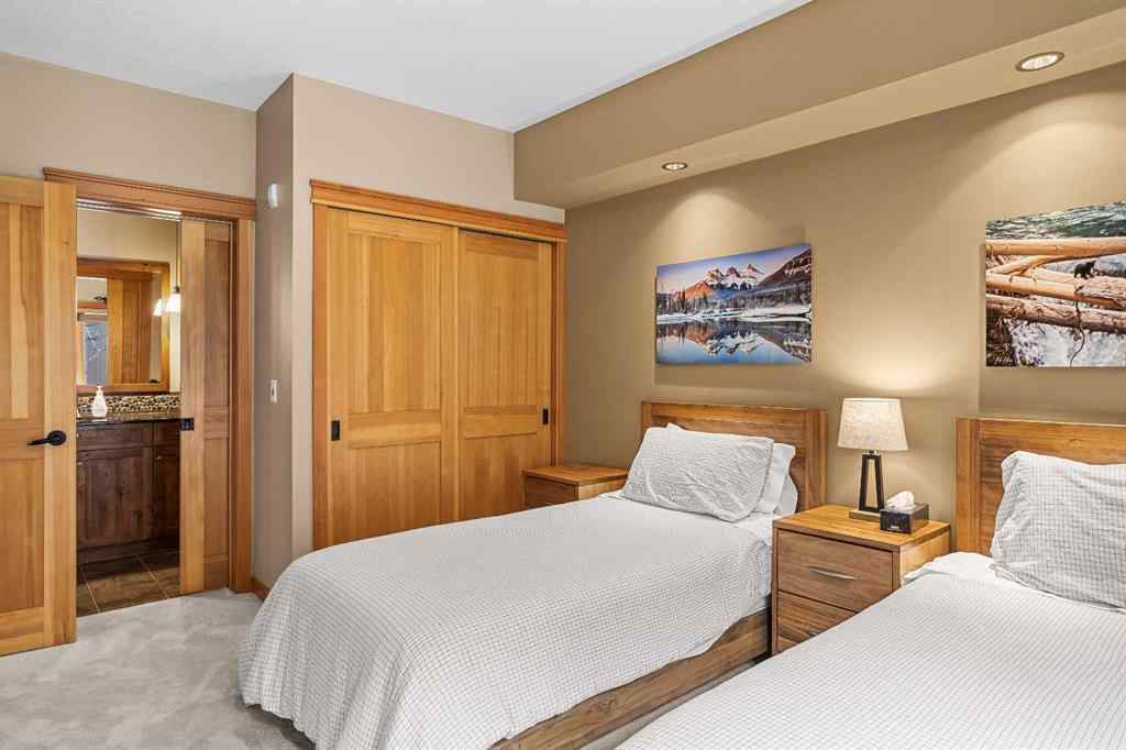 MLS® A2211505 - Unit #1106 101A STEWART CREEK Landing  in Three Sisters Canmore, Residential