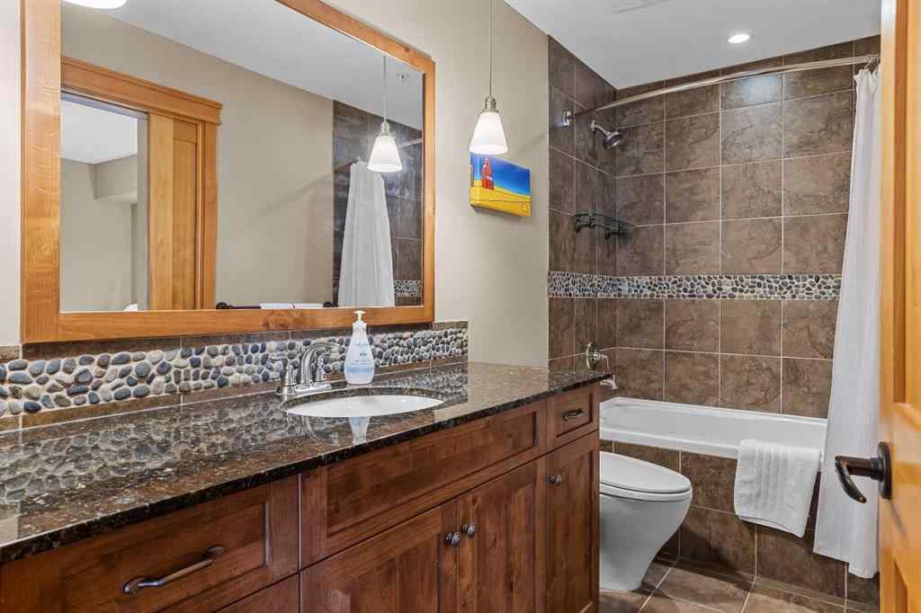 MLS® A2211505 - Unit #1106 101A STEWART CREEK Landing  in Three Sisters Canmore, Residential