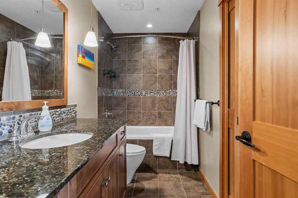 MLS® A2211505 - Unit #1106 101A STEWART CREEK Landing  in Three Sisters Canmore, Residential