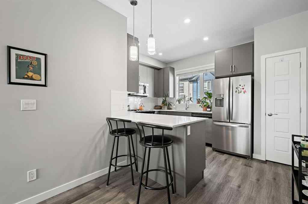 MLS® A2212073 - 376 210 Avenue SW in Belmont Calgary, Residential