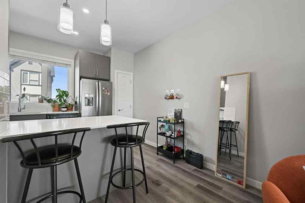 MLS® A2212073 - 376 210 Avenue SW in Belmont Calgary, Residential