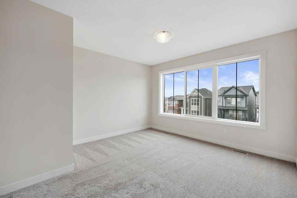 MLS® A2212095 - 43 Versant View SW in Alpine Park Calgary, Residential