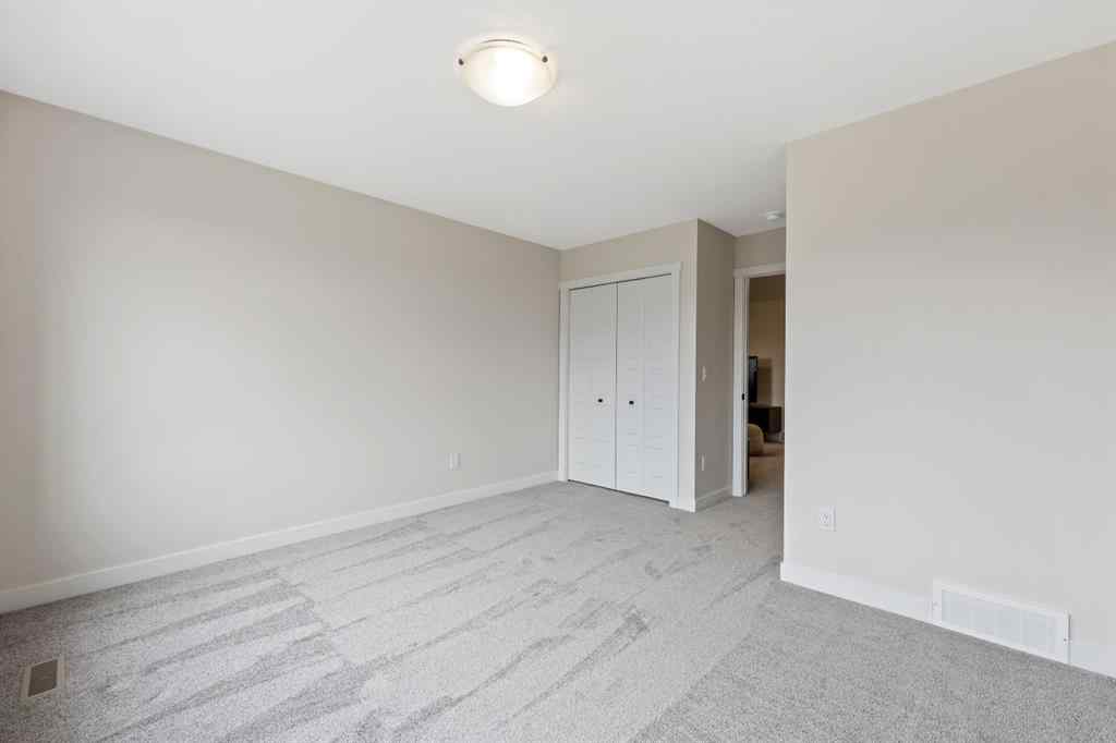 MLS® A2212095 - 43 Versant View SW in Alpine Park Calgary, Residential