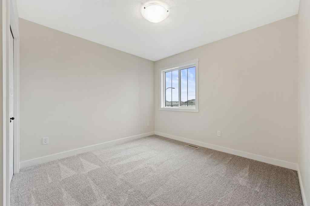 MLS® A2212095 - 43 Versant View SW in Alpine Park Calgary, Residential