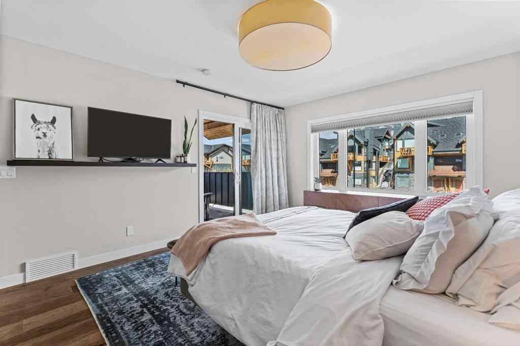 MLS® A2212238 - 414 Stewart Creek Close  in Three Sisters Canmore, Residential