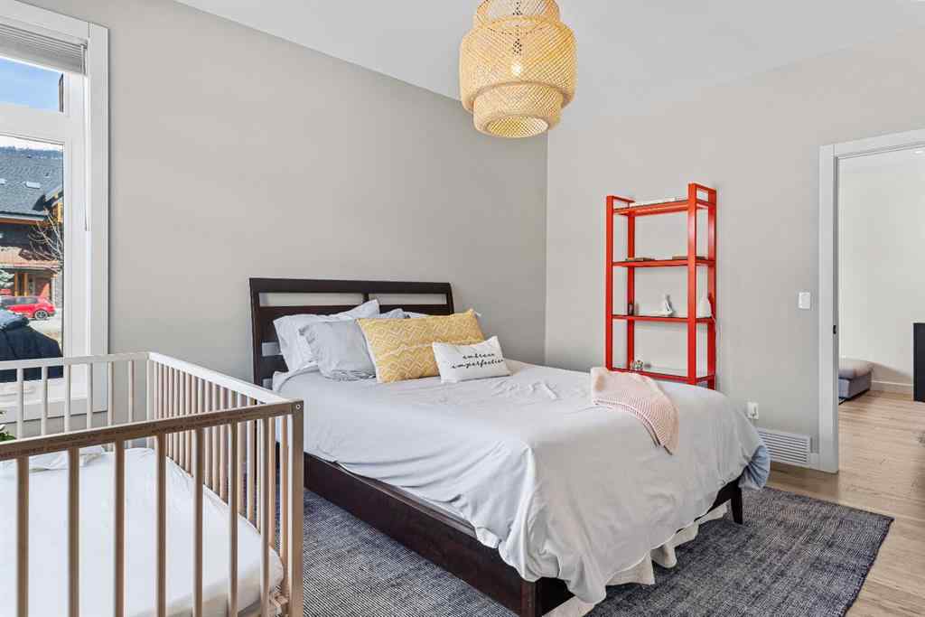 MLS® A2212238 - 414 Stewart Creek Close  in Three Sisters Canmore, Residential