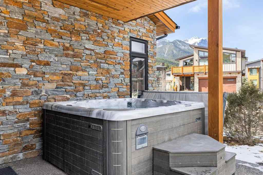MLS® A2212238 - 414 Stewart Creek Close  in Three Sisters Canmore, Residential