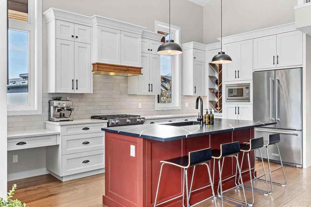 MLS® A2212238 - 414 Stewart Creek Close  in Three Sisters Canmore, Residential