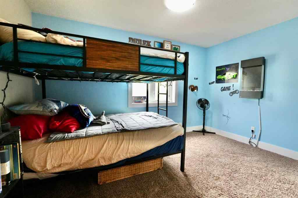 MLS® A2212380 - 10313 86 Street  in Saddleback Ridge Peace River, Residential