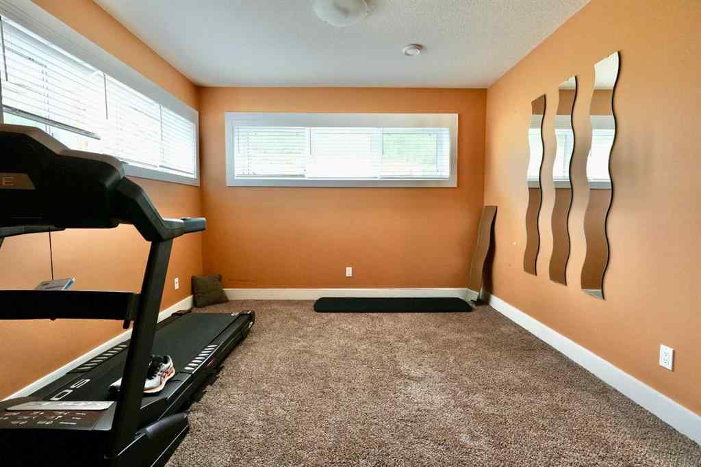 MLS® A2212380 - 10313 86 Street  in Saddleback Ridge Peace River, Residential