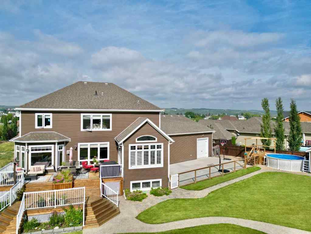 MLS® A2212380 - 10313 86 Street  in Saddleback Ridge Peace River, Residential