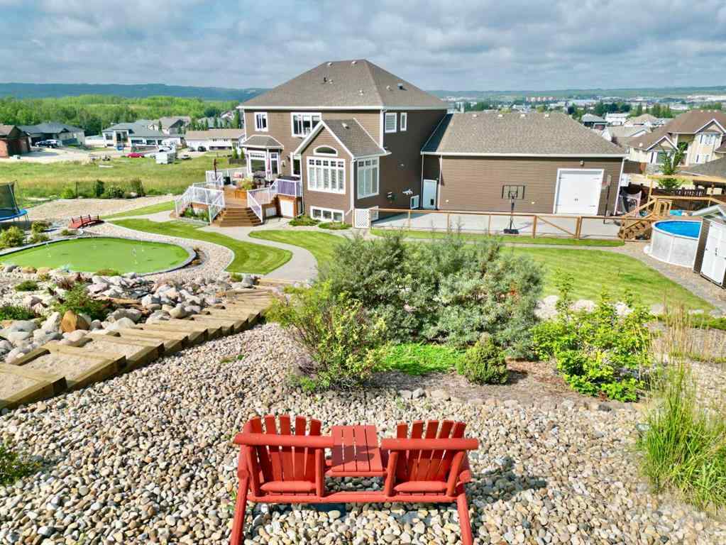 MLS® A2212380 - 10313 86 Street  in Saddleback Ridge Peace River, Residential