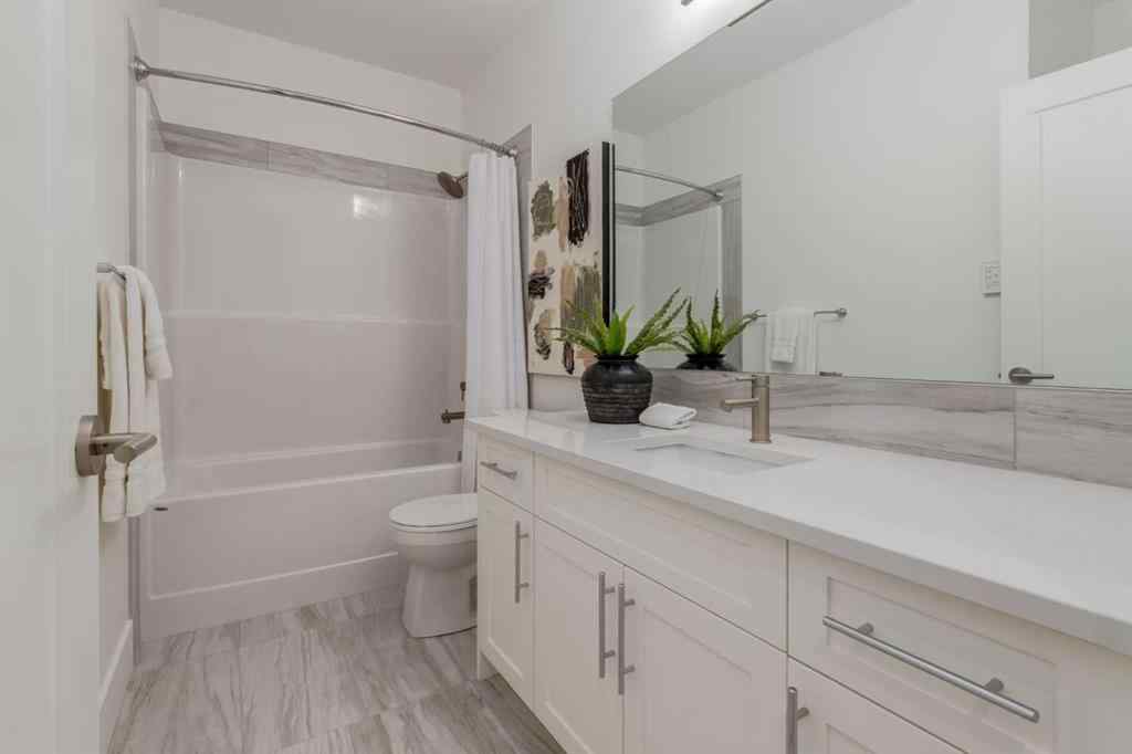 MLS® A2212722 - 90 Treeline Gardens SW in Alpine Park Calgary, Residential