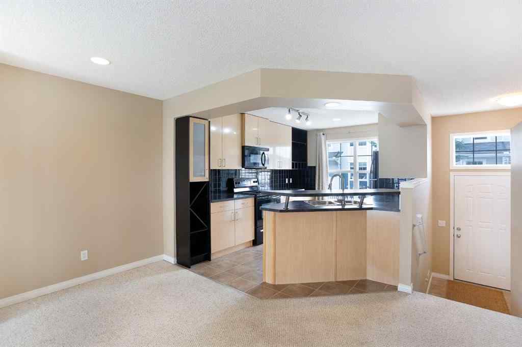 MLS® A2212858 - 3050 New Brighton Gardens SE in New Brighton Calgary, Residential