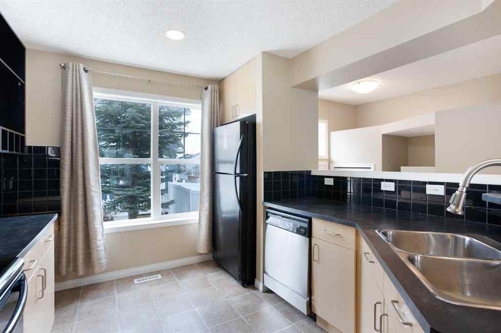 MLS® A2212858 - 3050 New Brighton Gardens SE in New Brighton Calgary, Residential