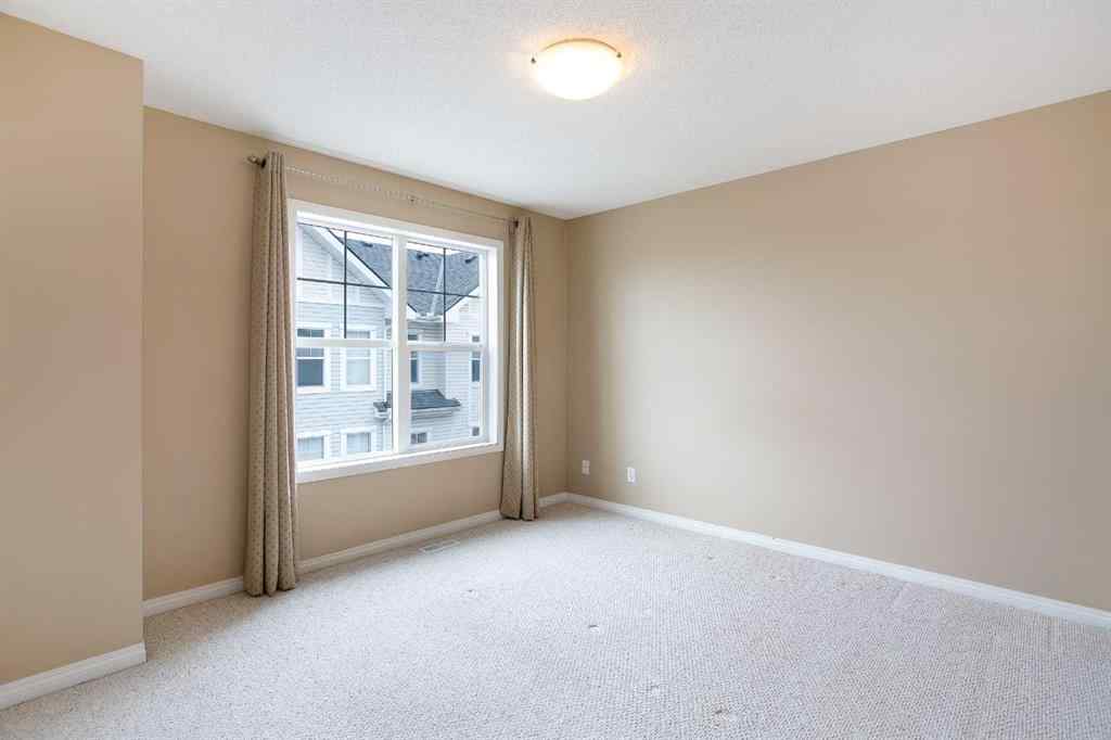 MLS® A2212858 - 3050 New Brighton Gardens SE in New Brighton Calgary, Residential
