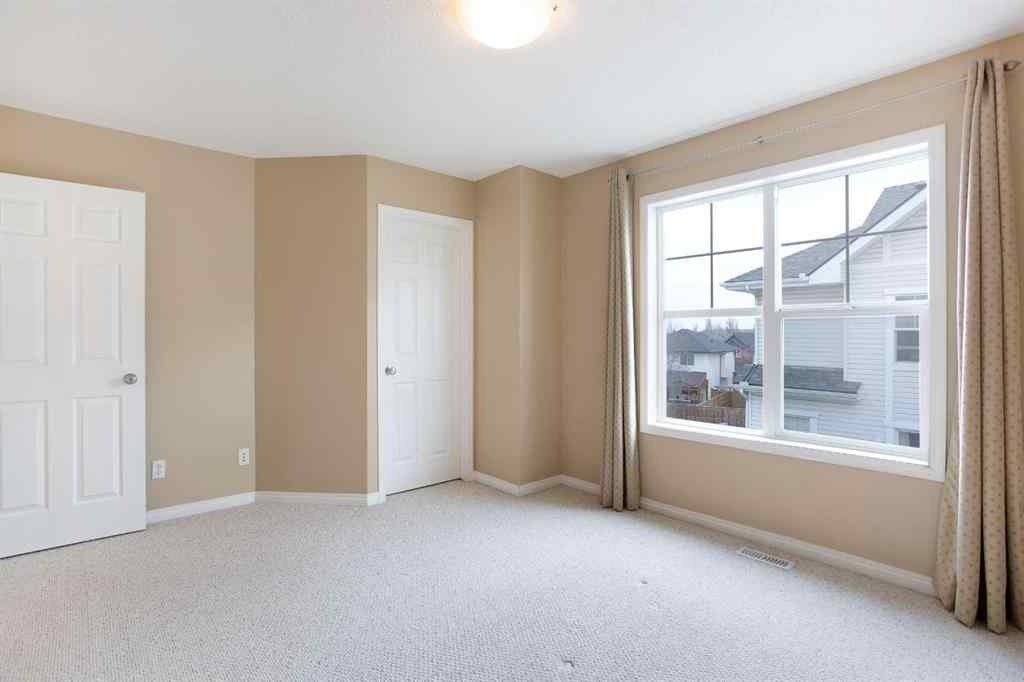 MLS® A2212858 - 3050 New Brighton Gardens SE in New Brighton Calgary, Residential