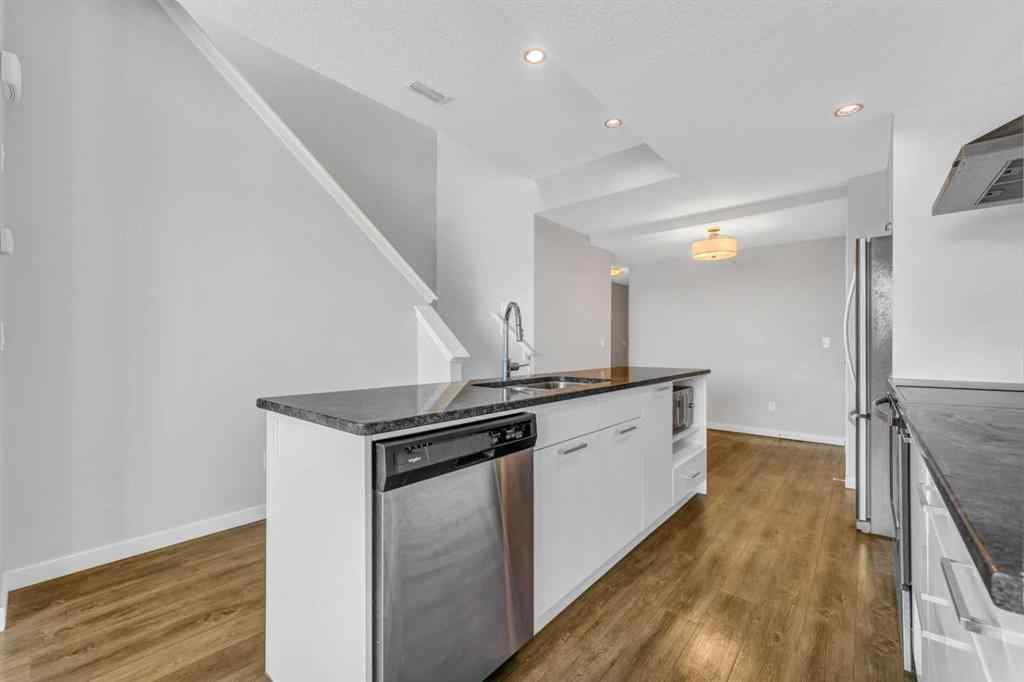MLS® A2212914 - 8429 Saddlebrook Drive NE in Saddle Ridge Calgary, Residential