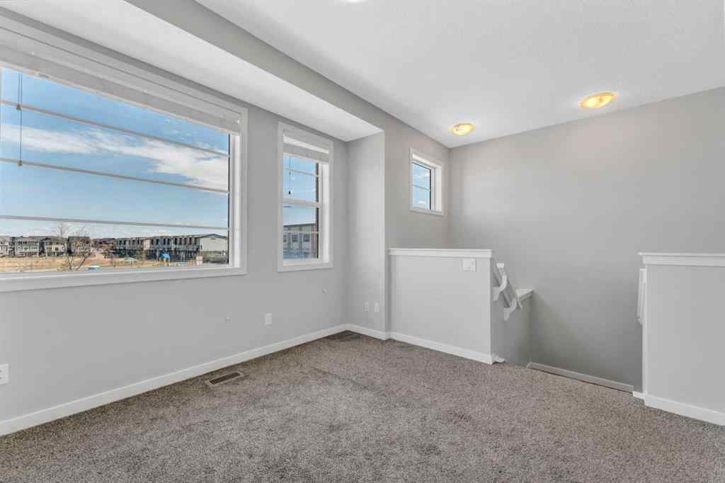 MLS® A2212914 - 8429 Saddlebrook Drive NE in Saddle Ridge Calgary, Residential