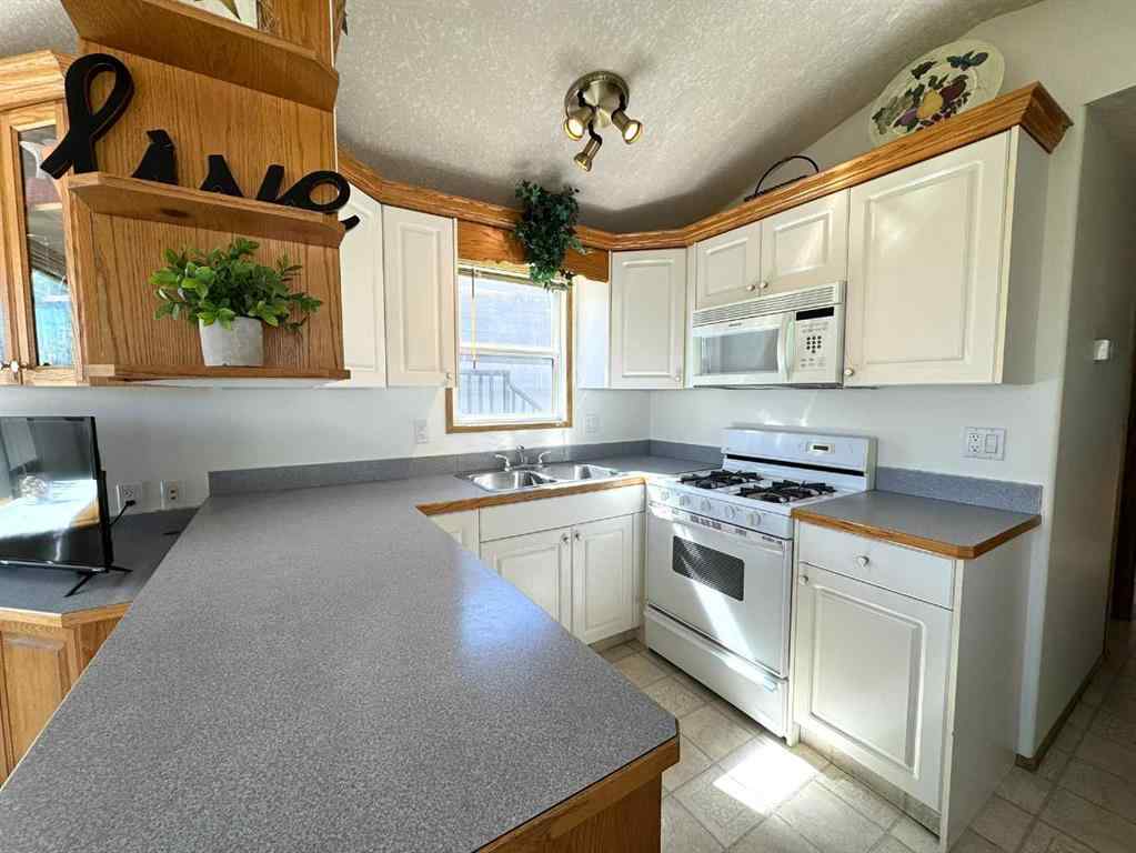 MLS® A2213218 - Unit #2010 35468 Range Road 30   in Gleniffer Lake Rural Red Deer County, Residential