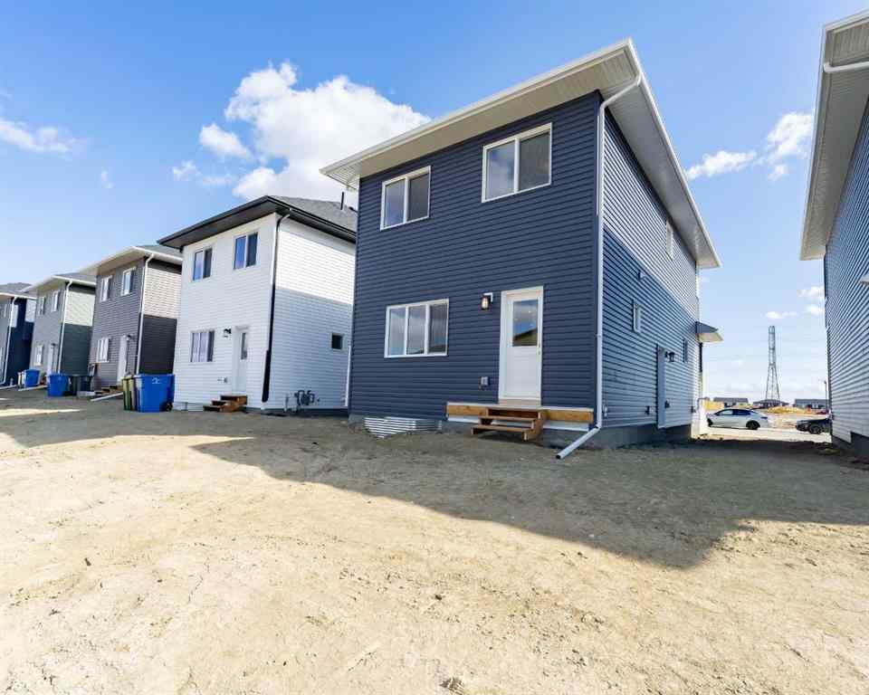 MLS® A2213236 - 405 Dawson Wharf Road  in Dawson\'s Landing Chestermere, Residential